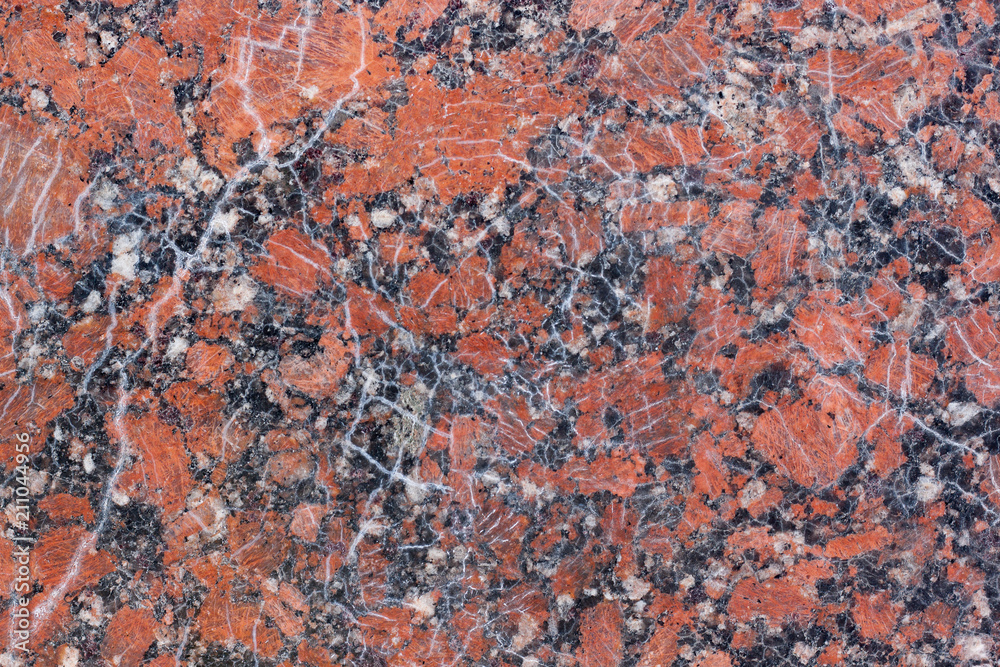 Granite texture with black and gray spots. Used as a background. Granite texture with black and gray spots. Used as a background.