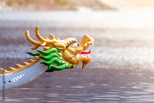 Decorated figurehead of dragon boat photo