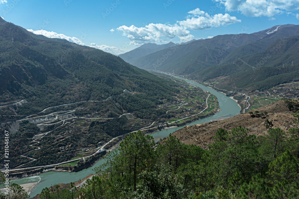 The Panorama Top view Jinsha River Flowing from the Tiger Leaping Gorge it one of the deepest in the world, Lijiang, Yunnan, China