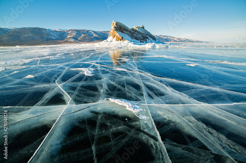 Transparent ice with cracks on Lake Baikal near Ogoy island. Siberia, Russia. photo