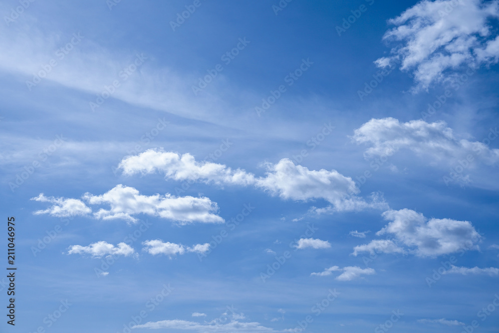 background of blue sky with fluffy white clouds background of blue sky with fluffy white clouds