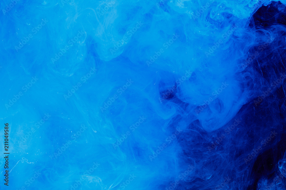 Splash water abstract. Blue ink background Splash water abstract. Blue ink background