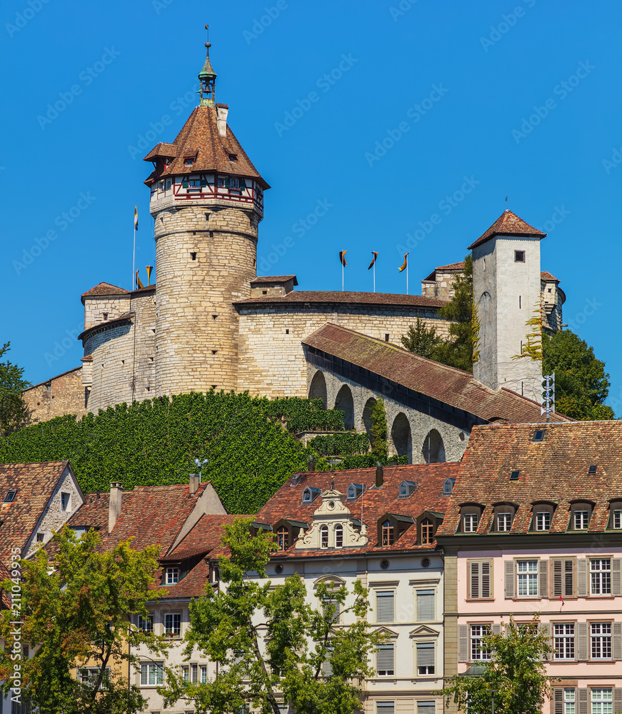 Buildings of the historic part of the Swiss city of Schaffhausen, medieval fortress Munot above them
