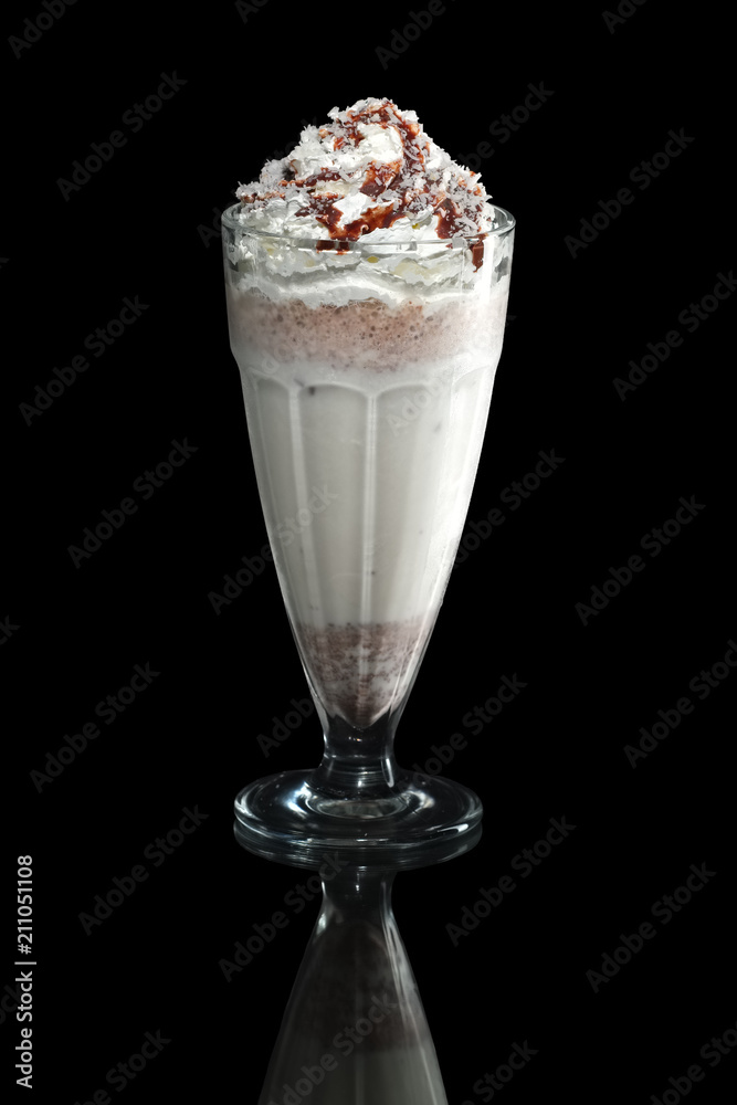 Milkshake caramel summer cocktail isolated on black Milkshake caramel summer cocktail isolated on black