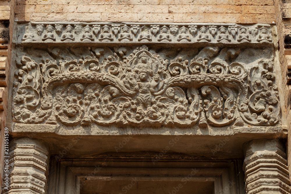 Ancient stone bas-relief in Angkor Wat temple, Cambodia. Ancient temple floral decor. Angkor Wat detail