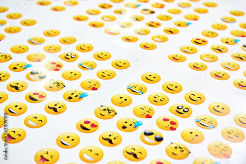 Funny yellow smileys on a white background
