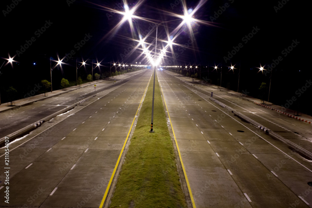green traffic island at night green traffic island at night