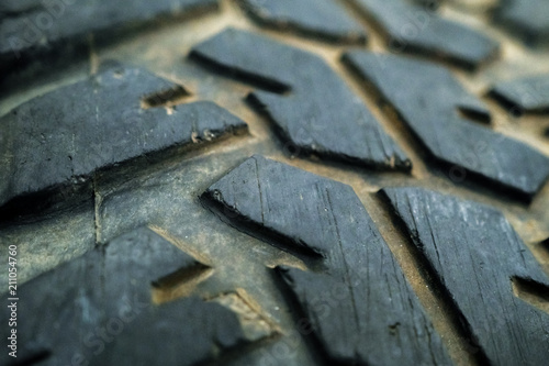 Texture of old rubber wheel machine. Close-up