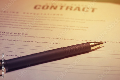 Pen and contract paper