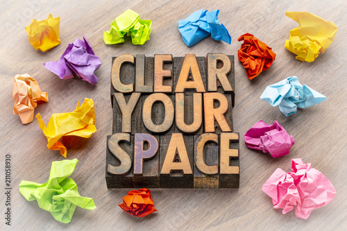 clear your space - word abstract in wood type photo