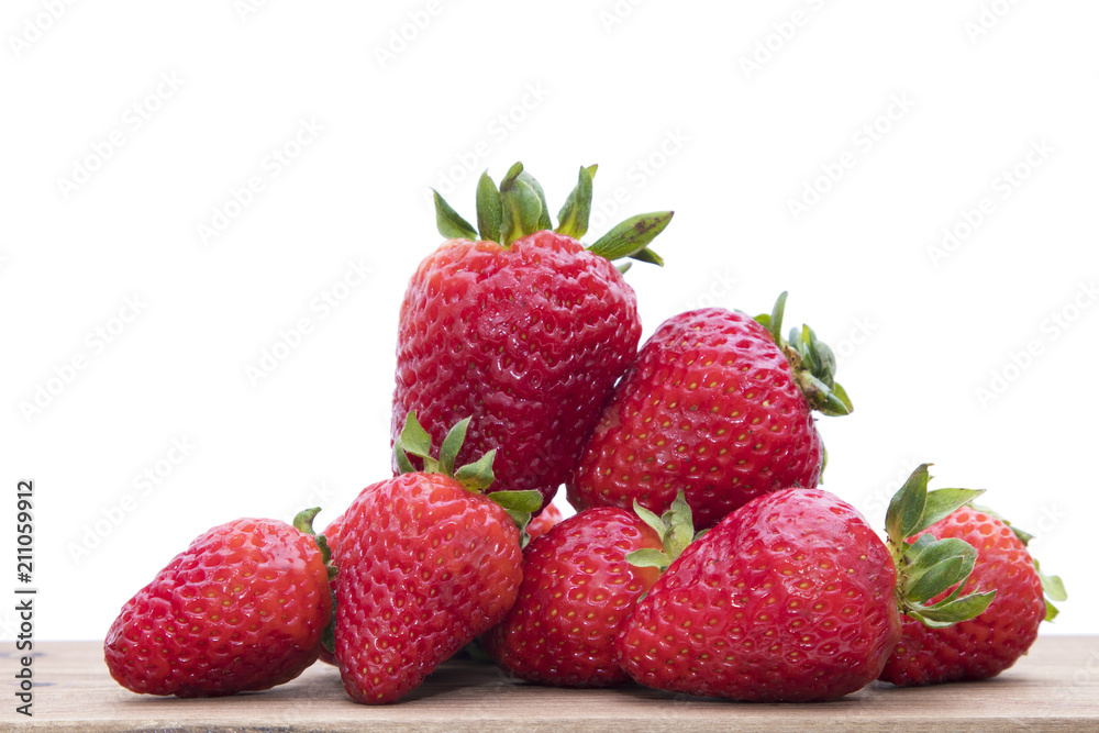 isolated strawberries on a background in wood isolated strawberries on a background in wood