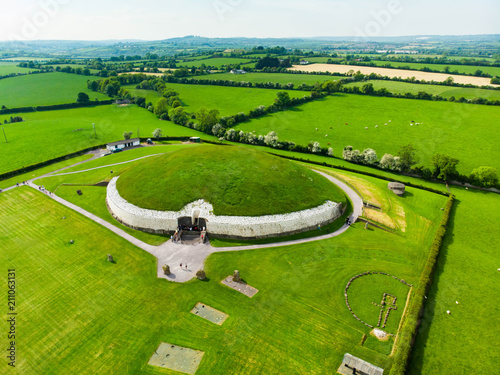 Newgrange, a prehistoric monument built during the Neolithic period, located in County Meath, Ireland photo