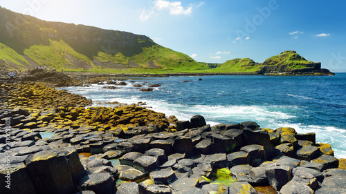Giants Causeway, an area of hexagonal basalt stones, created by ancient volcanic fissure eruption, County Antrim, Northern Ireland. photo
