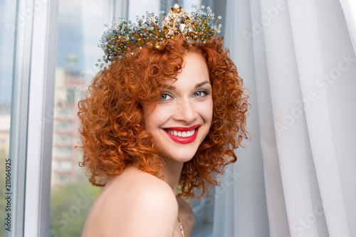 woman with crown fashion model person girl looking at you camera smiling photo
