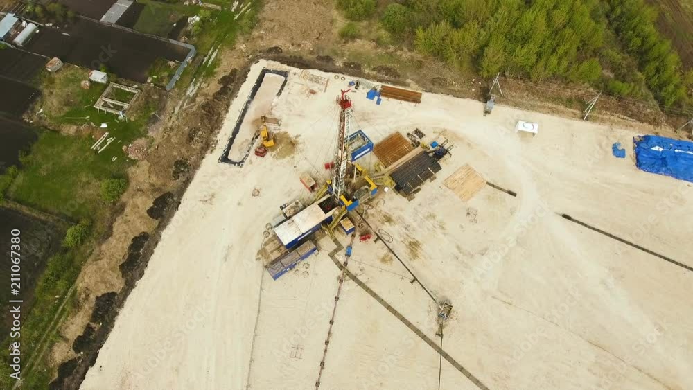 construction site covered with sand and crane construction site covered with sand and crane
