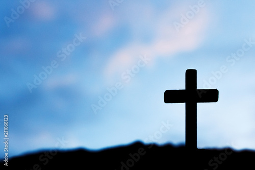 Silhouette jesus christ on cross background Abstract for christian religion at sunset