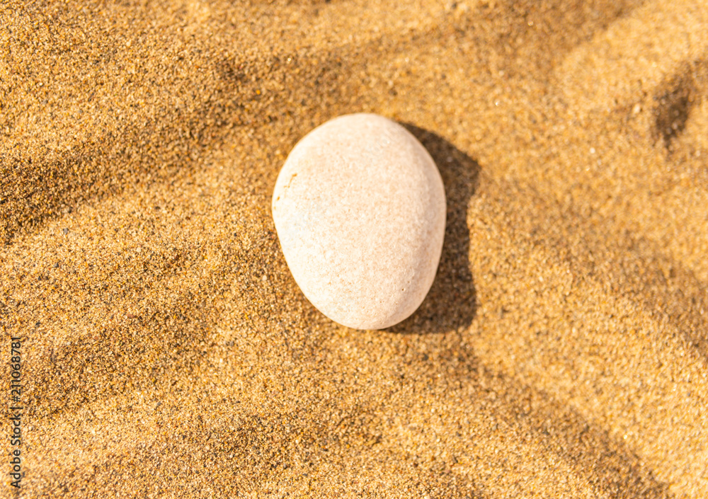 zen meditation stone in sand, concept for purity harmony and spirituality, spa wellness and yoga background zen meditation stone in sand, concept for purity harmony and spirituality, spa wellness and yoga background