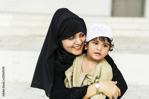 Muslim mother and her son photo