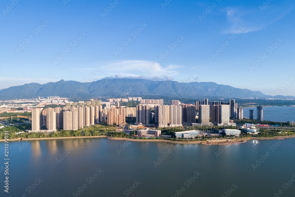 jiujiang cityscape with mountains-water