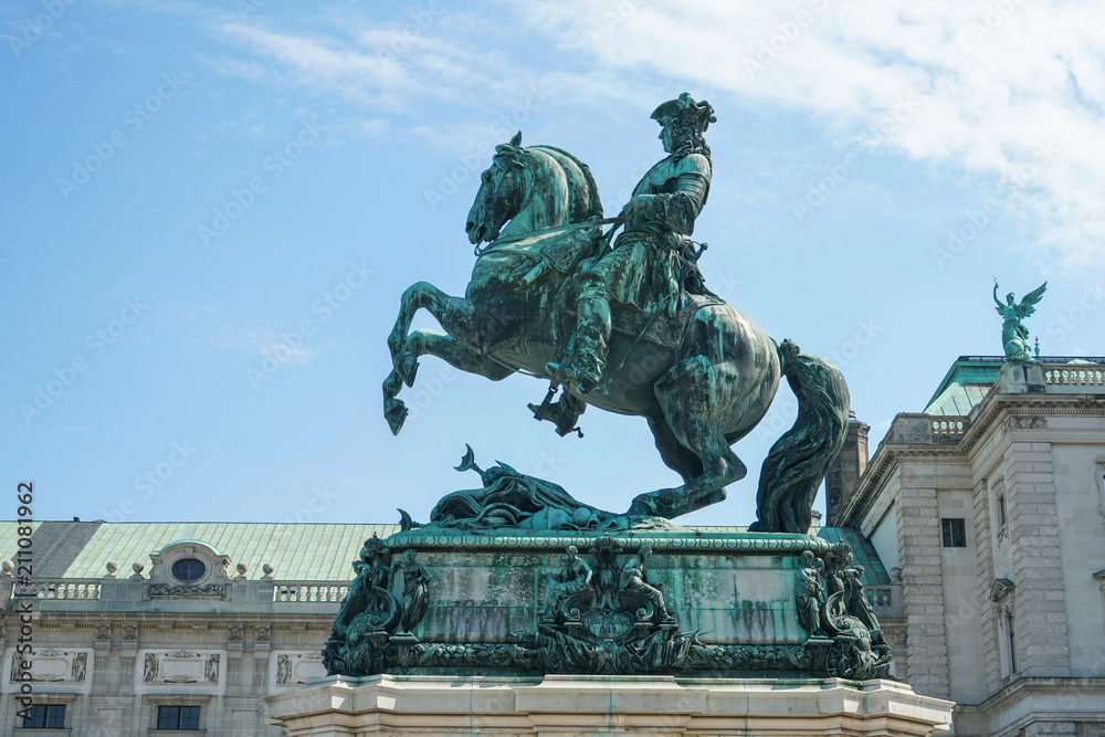 Statue of Emperor Joseph II with horse lifting two leg in front of Hofburg Palace Vienna Austria.