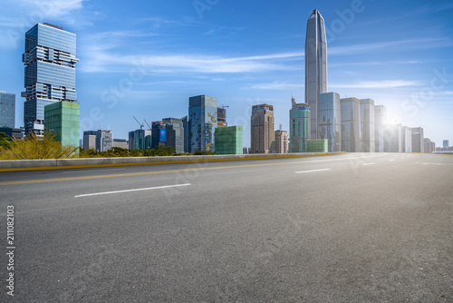 empty road with panoramic cityscape