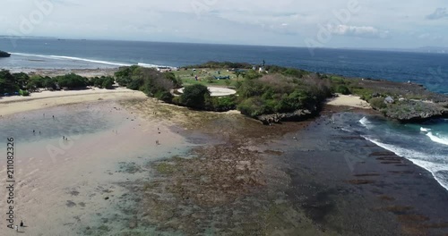 Stunning coastal landscape in Bali, Indonesia. Drone shot of Mengiat Beach scene in Bali, South east Asia photo