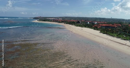 Stunning coastal landscape in Bali, Indonesia. Drone shot of Mengiat Beach scene in Bali, South east Asia photo