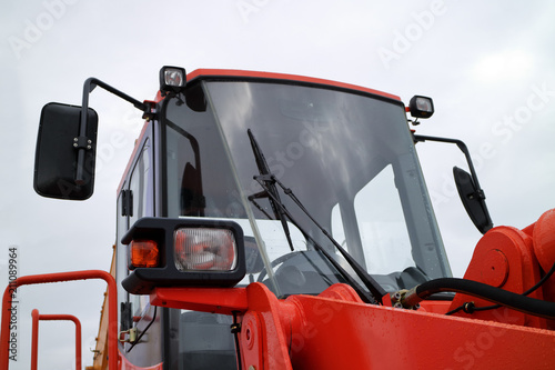 The working light of a modern tractor. Lighting equipment of a modern tractor. photo