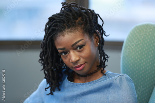 Valokuva Charming young black woman looking at camera