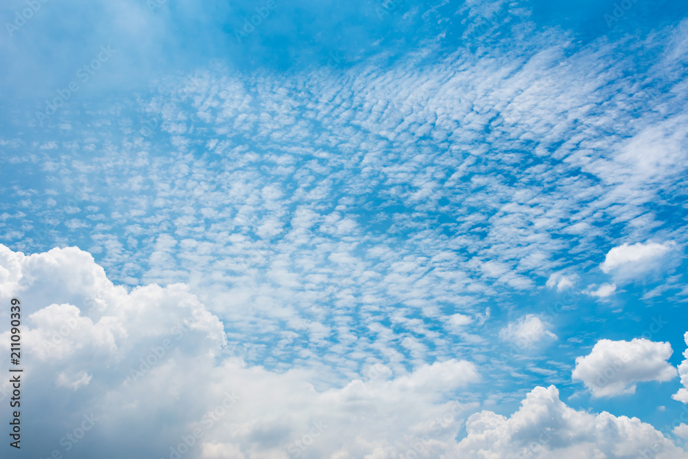 Cirrocumulus clouds in blue sky