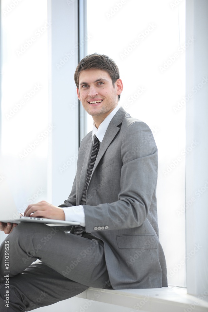 businessman talking on the Internet using a laptop businessman talking on the Internet using a laptop