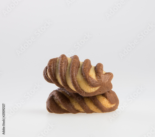 cookie or biscuits filled with chocolate cream on a background.