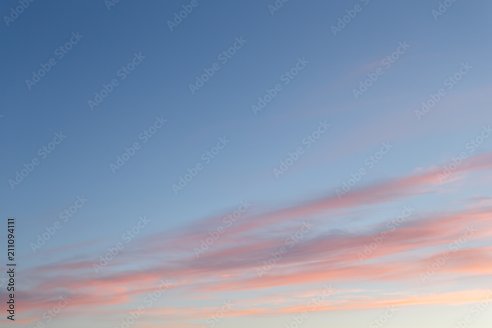 Beautiful sunset sky with pink and blue colors