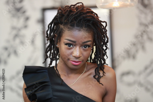 Valokuva Beautiful black woman with dreadlocks