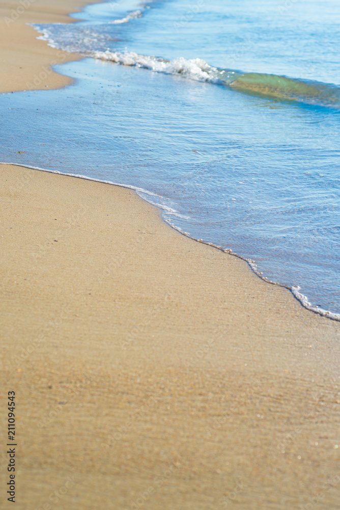 Beautiful waves on the beach from the ocean or the sea Beautiful waves on the beach from the ocean or the sea