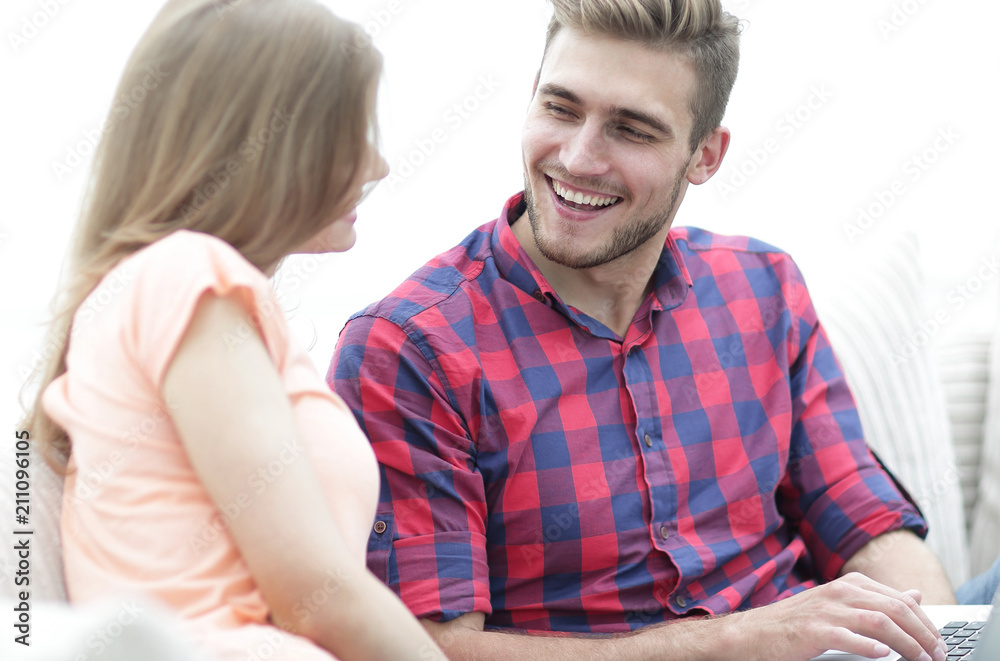 closeup of young couple with laptop