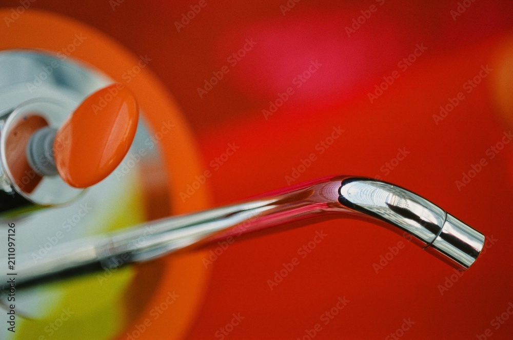 crane design red color water plastic object concept orange