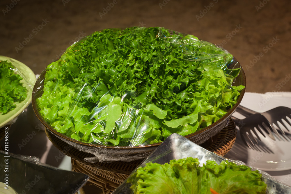 Vegetable salad on plastic wrap for buffet line in wedding party. Vegetable salad on plastic wrap for buffet line in wedding party.