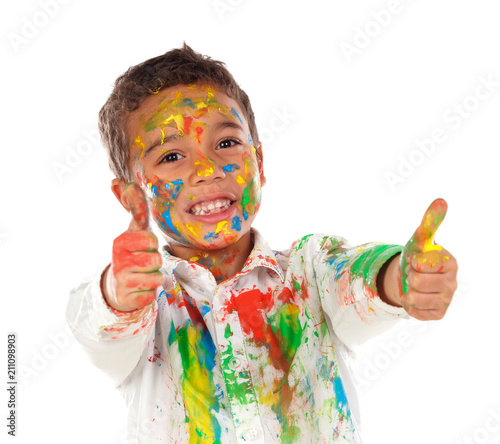 Funny boy with hands and face full of paint saying Ok © Gelpi