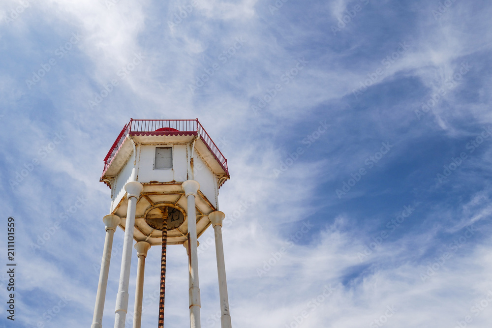 Low angle view of maritime lighthouse at Port Vendres with amazing cloudy blue sky, South of France Low angle view of maritime lighthouse at Port Vendres with amazing cloudy blue sky, South of France