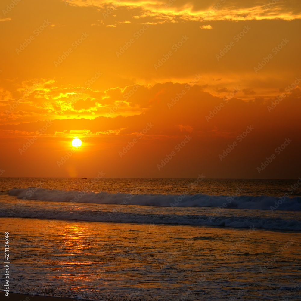 Fototapeta premium Beach of the ocean and golden sun rise.