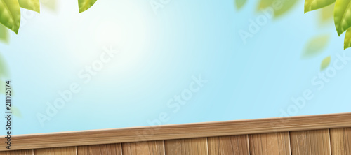 Wooden fence on clear blue sky