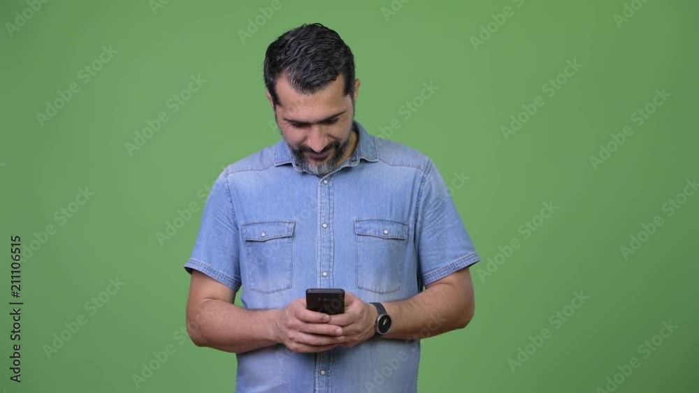 Handsome Persian bearded man using phone Handsome Persian bearded man using phone