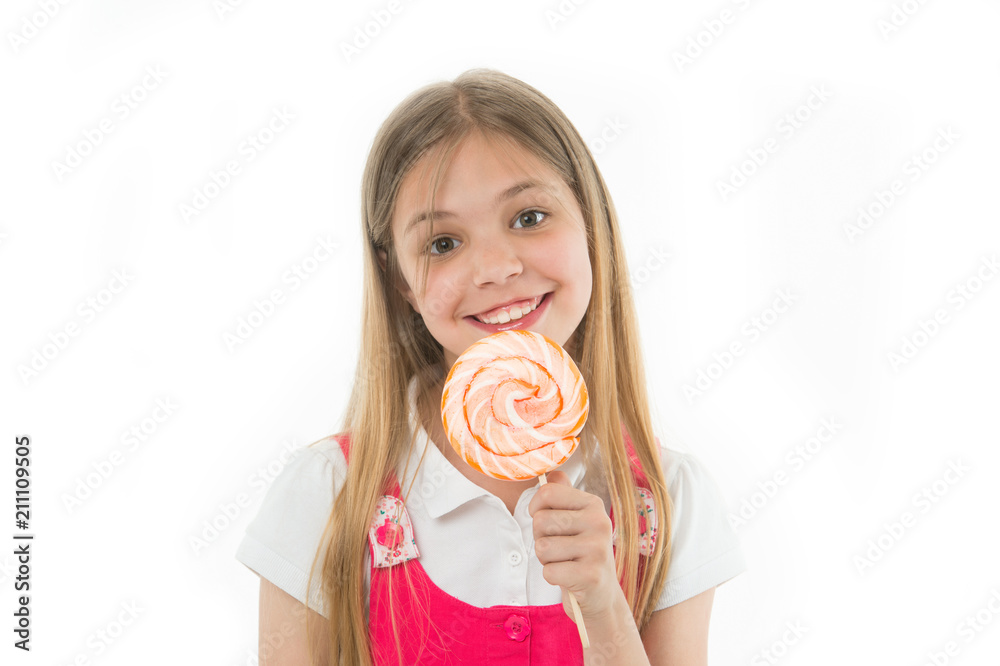 I need treat. Girl cute smiling face holds sweet lollipop. Sweets in appropriate portions ok. Girl likes sweets as lollipop candy, isolated white background. Celebrate holidays birthdays with sweets