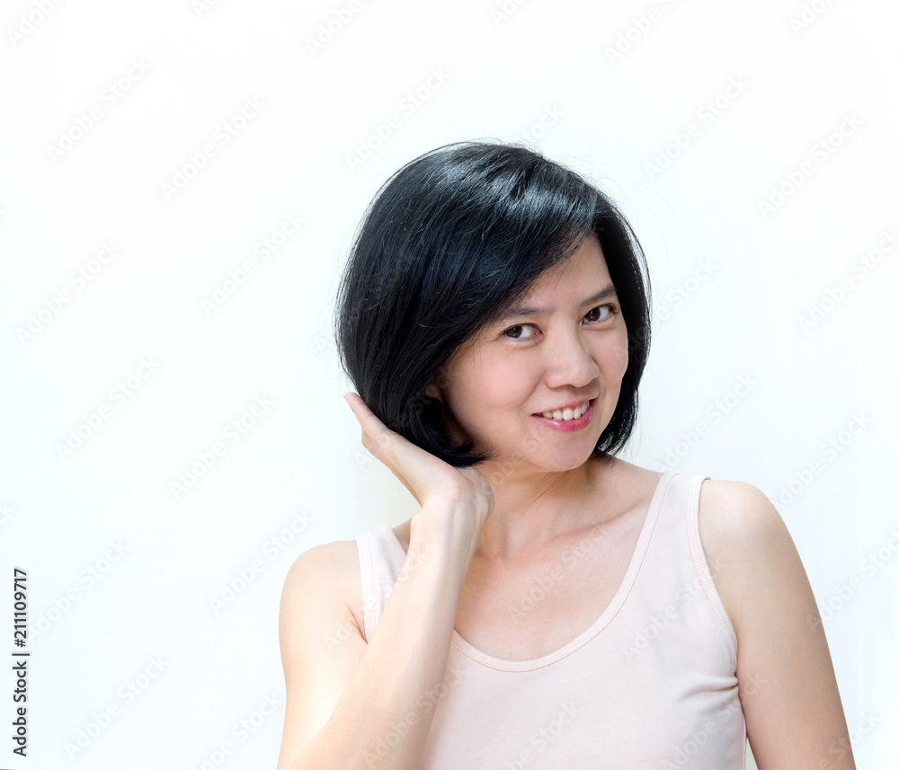 Beautiful smiling Asian women with clean skin, natural make-up, short black  hair isolated on white background. Middle aged woman showing her new hair  style, Concept Coloring Hair. Beauty Salon. Stock Photo |