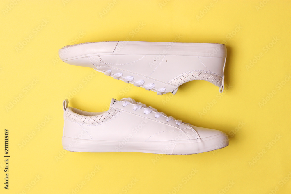 men's gym shoes on a colored background top view. men's footwear. minimalism