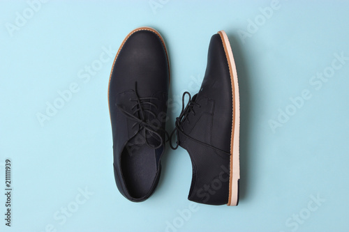 men's shoes on a colored background top view. men's footwear.