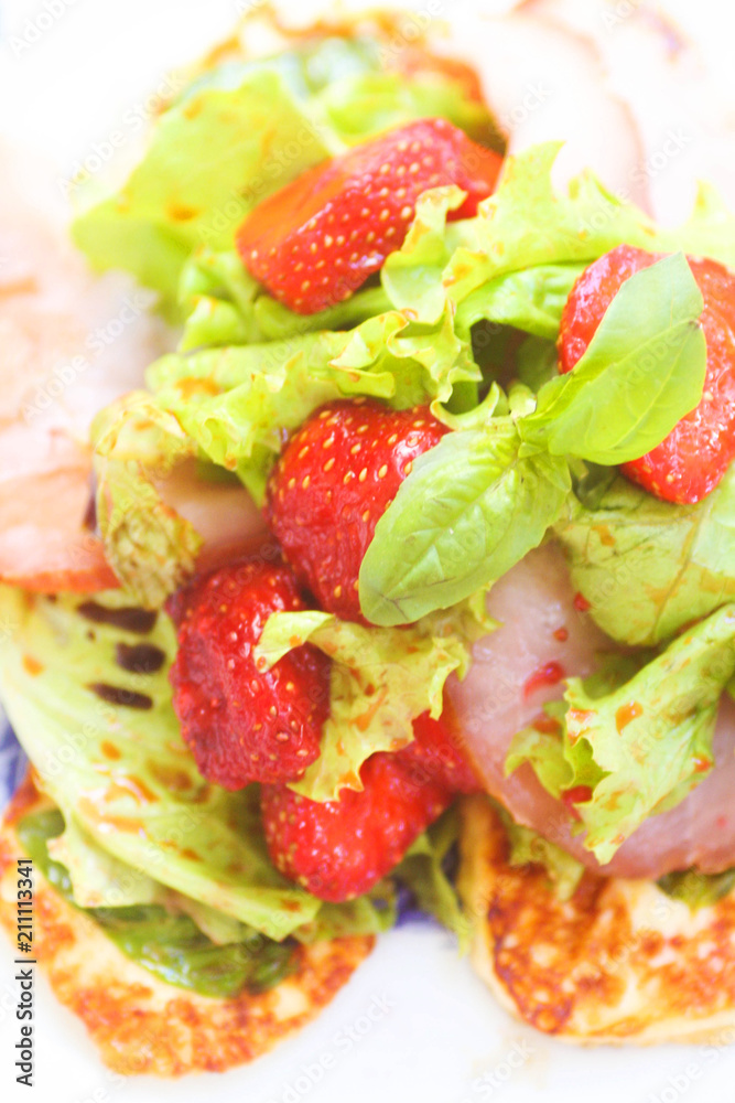 Salad with strawberries and ham Salad with strawberries and ham