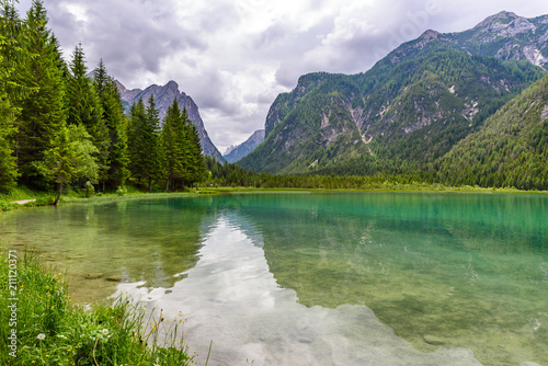 Lake Dobbiaco (Toblacher See, Lago di Dobbiaco) in Dolomite Alps, South Tirol, Italy - Travel destination in Europe photo