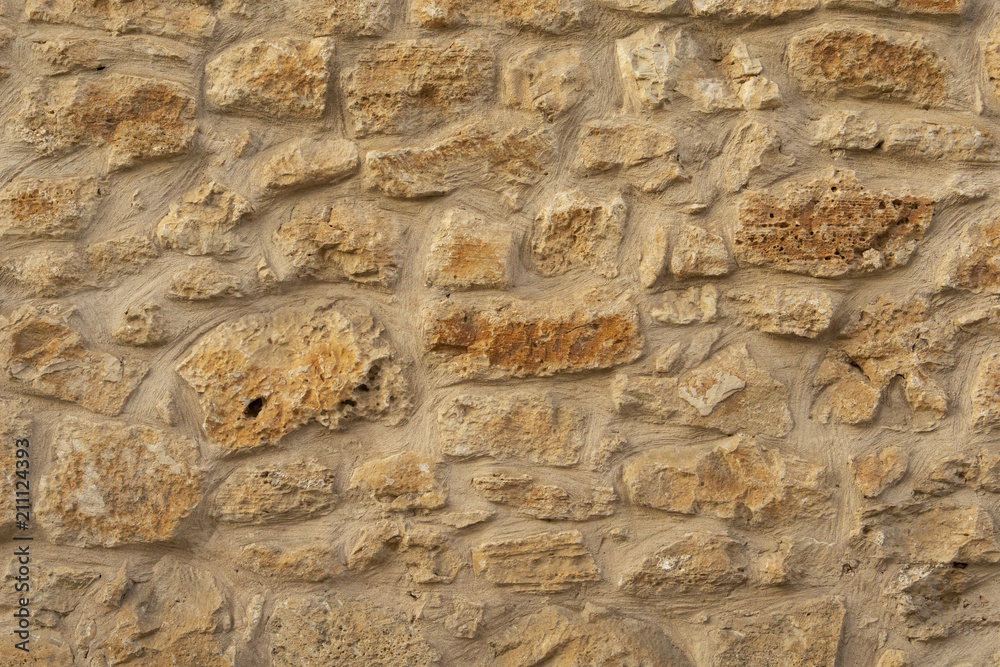 Old wall texture background, Majorcan traditional masonry plastered with lime
